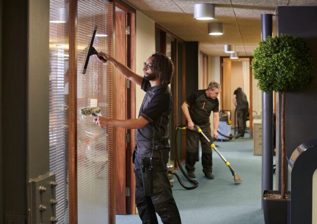 PCT Janitorial - Top Janitorial and Commercial Cleaning Services in Kennesaw, GA with team cleaning office building hallway. PCT Janitorial - Top Janitorial and Commercial Cleaning Services in Kennesaw, GA with team cleaning office building hallway.